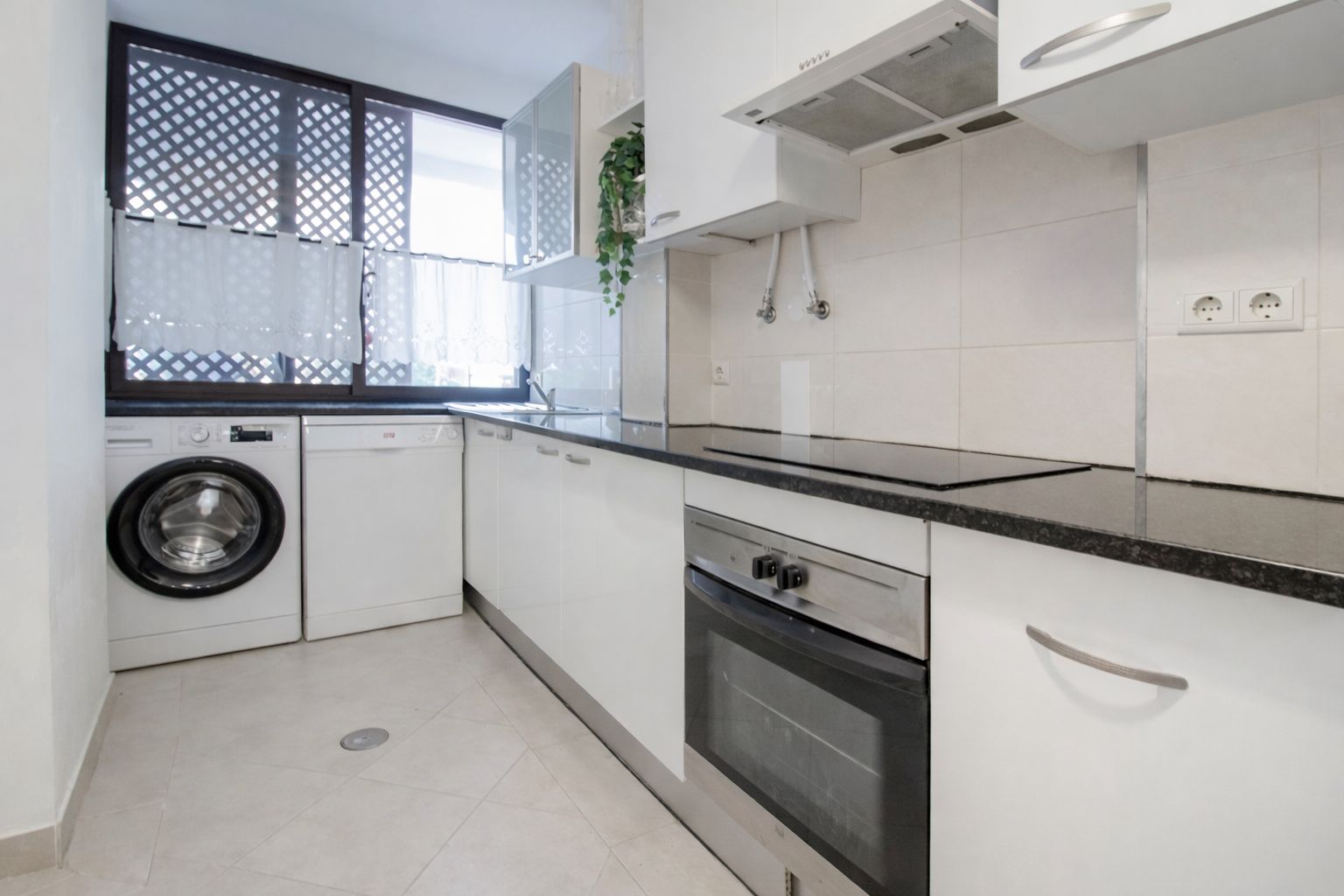 Kitchen countertop with Nespresso machine and a fresh fruit bowl