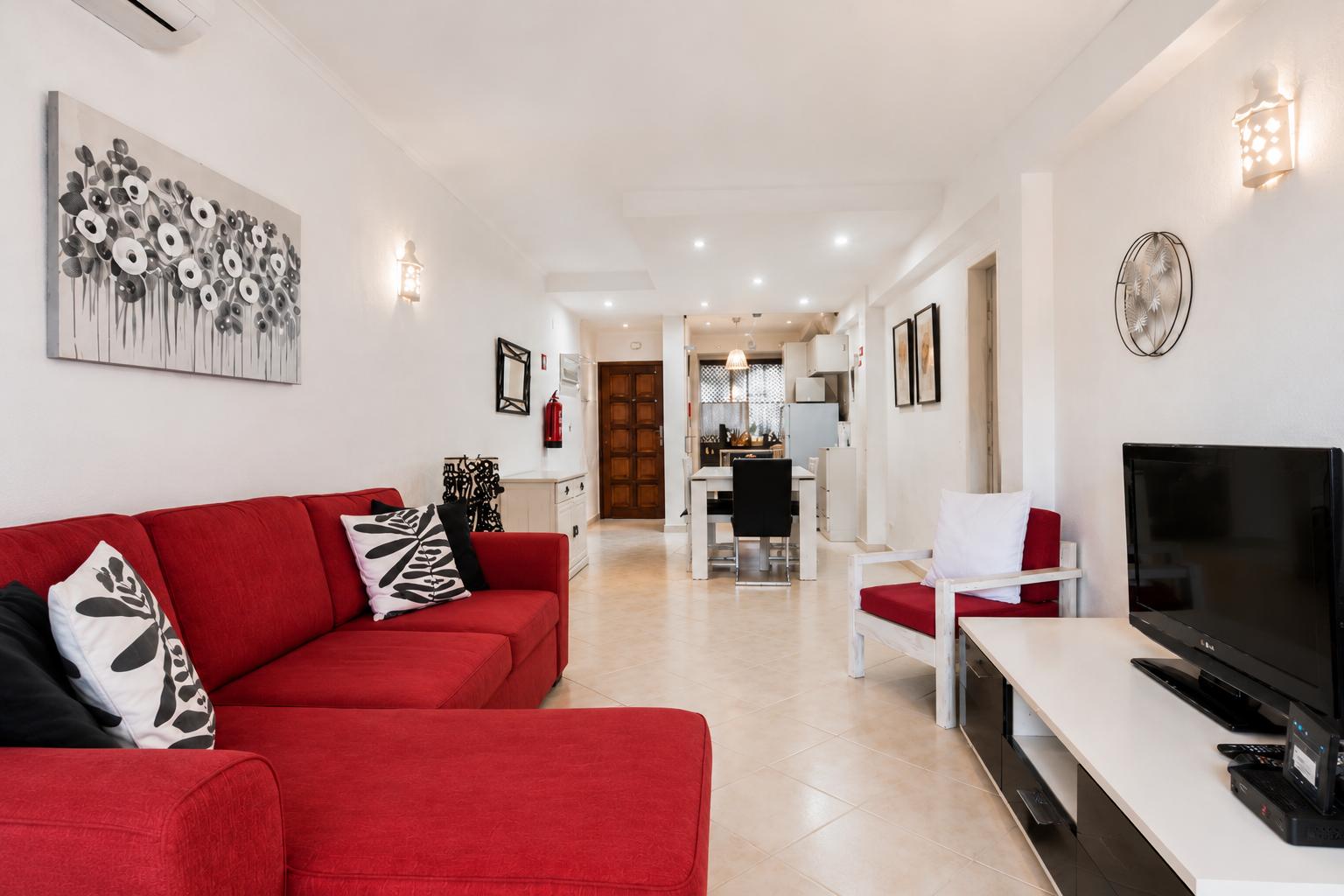 Living room — wide shot showing full space and patio doors